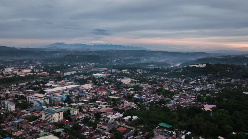 Buildings and residential area at dusk time in Cagayan de Oro. Mindanao, Philippines. Cityscape.
