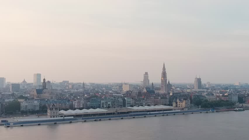 Dolly zoom. Antwerp, Belgium. Panorama overlooking the Cathedral of Our Lady (Antwerp). Historical center of Antwerp. City is located on the river Scheldt (Escaut). Summer morning, Aerial View