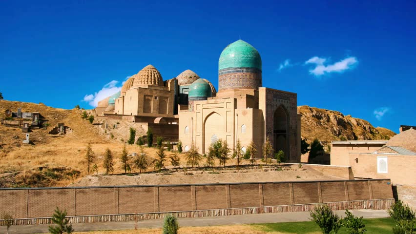 Awesome view of the Shah-i-Zinda Ensemble in Samarkand, Uzbekistan. Mausoleums decorated by blue tiles with designs. The necropolis is a popular tourist attraction of Central Asia.