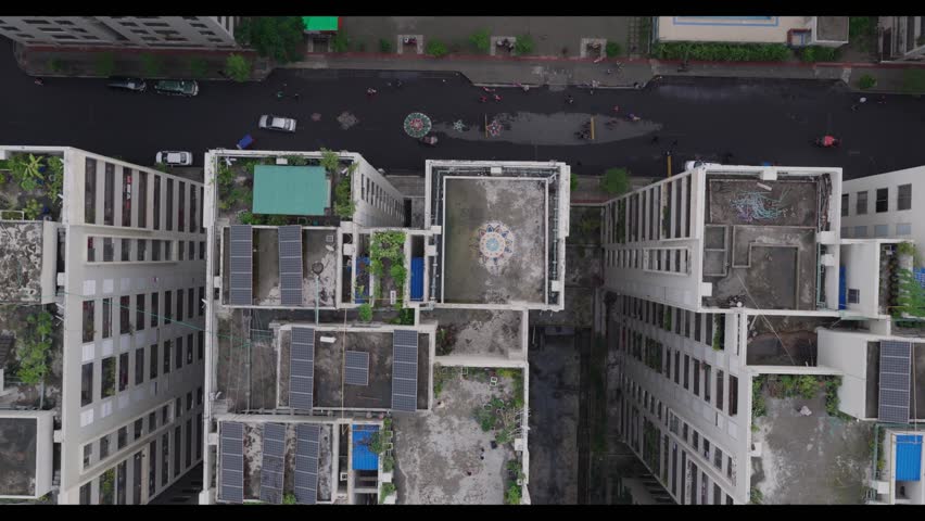 Top-down aerial drone view showcasing the dense urban buildings and architecture of Dhaka, the capital of Bangladesh