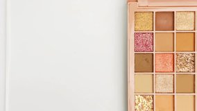 Woman Rubbing Glitter Makeup onto Back of Hand in 4K Ultra HD Close-Up Video - Powered by Shutterstock - Get 15% off with code: PIKWIZARD15