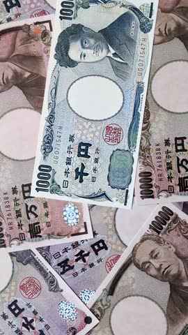 Japanese paper currency, the background of Japan's money. Asian business, sales, insurance, taxes