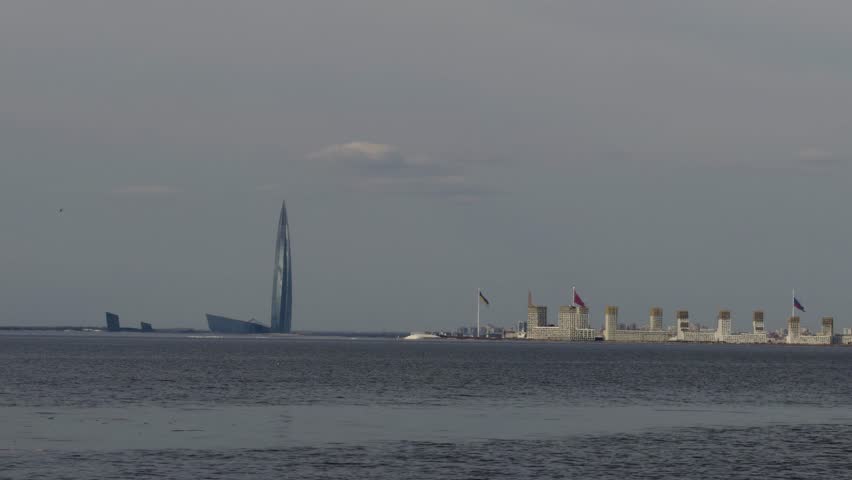 A wide, distant shot captures the iconic Lakhta Center skyscraper, Russia