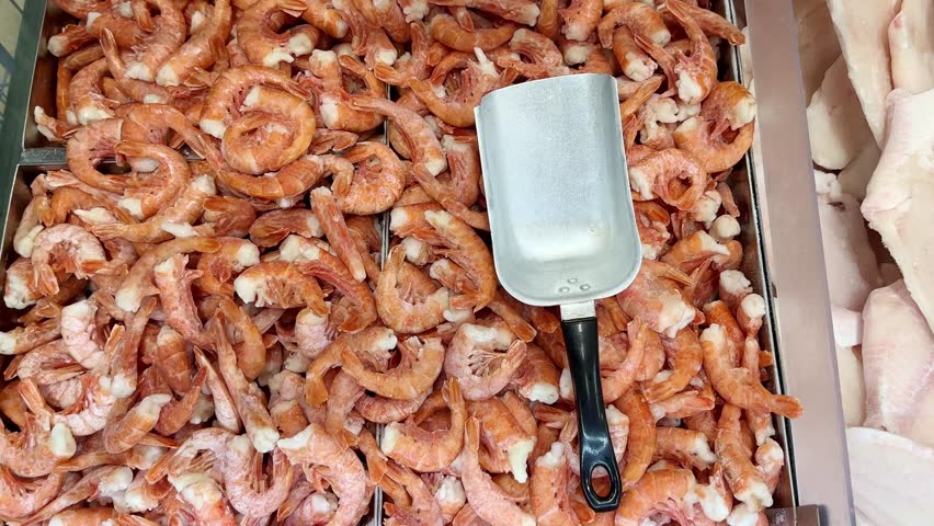 Buying seafood at the grocery store