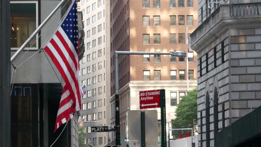 New York City, United States. Lower Manhattan Downtown Financial District urban architecture. American flag. Federal Reserve Bank building near Wall street Stock Exchange. USA Federal Reserve System.