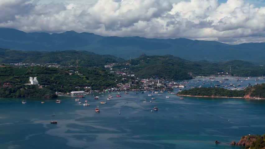 labuan Bajo aerial top view with a lot Phinisi Boat - at Morning	