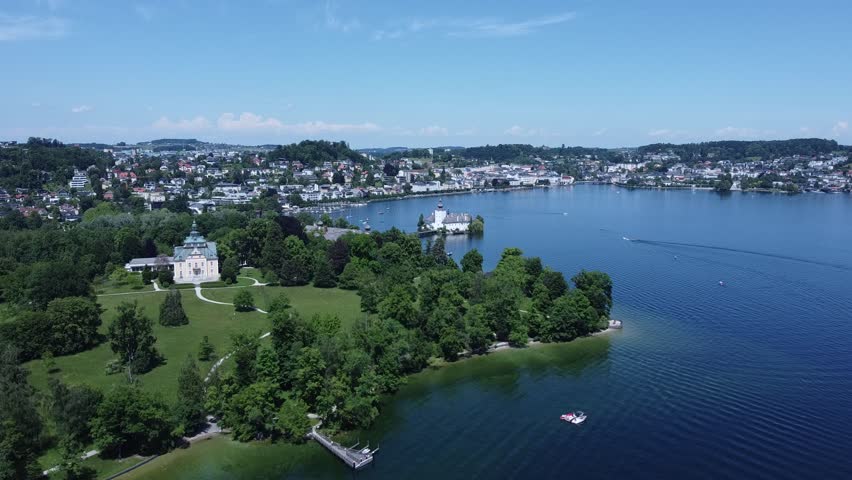 Toskana Park and castle Ort Seeschloss Ort in Gmunden at lake Traunsee in Upper Austria, aerial video