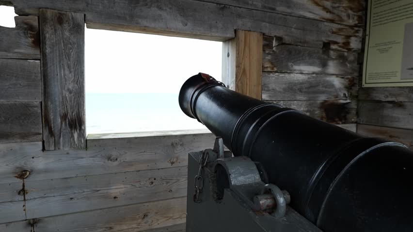 Cannon Overlooking the Water in a Fort