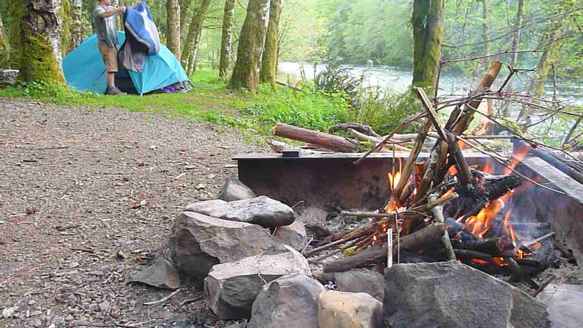 Time lapse of man at campsite in the Pacific Northwest, Oregon.