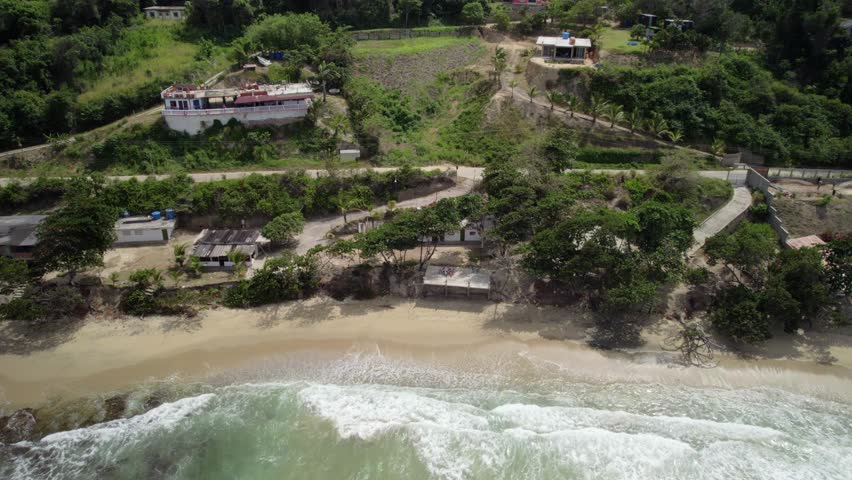 Large oceanfront homes on hills overlooking the Caribbean coastline in La Guaira