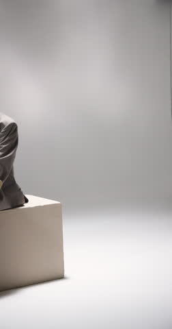 Vertical video: Two women in stylish outfits posing confidently in modern fashion studio. style, elegance, confidence, trend, contemporary, couture