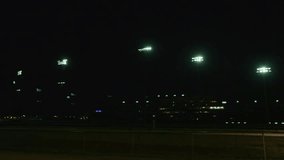 Timelapse of stadium lights turning on - Powered by Shutterstock - Get 15% off with code: PIKWIZARD15