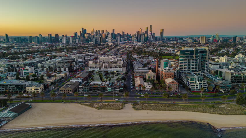 Aerial hyperlapse, dronelapse video of Melbourne city at sunset