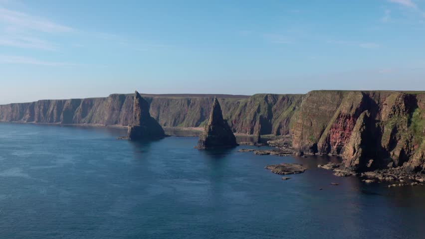 Slow panning shot of the Duncansby Stacks off the shore of Duncansby Head