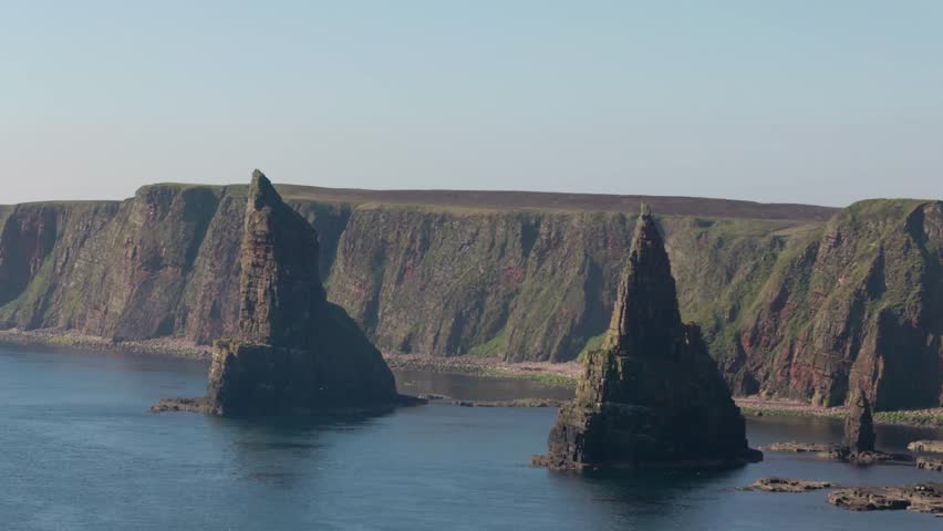 Static shot of the beautiful Duncansby sea stacks on a summers day