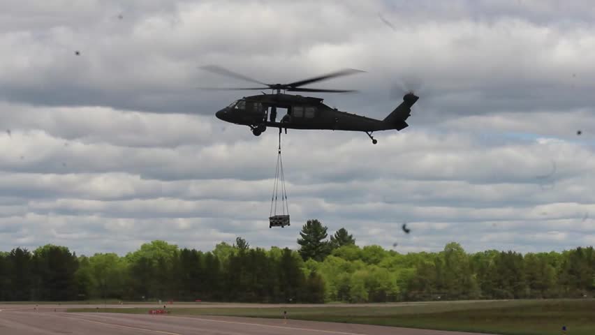 A UH-60 Black Hawk helicopter supports slingload training with the Army Reserve