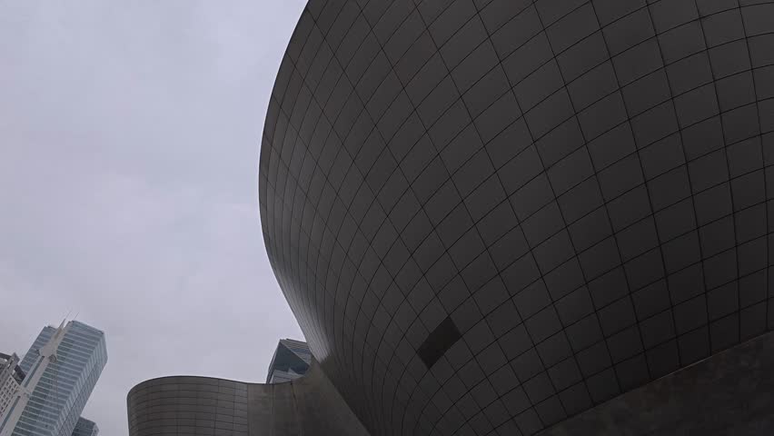 The Tri-Bowl - Three Interconnected Bowl-shaped Structures - Cultural Landmark At Songdo Central Park In Incheon, South Korea. closeup, tilt-down shot