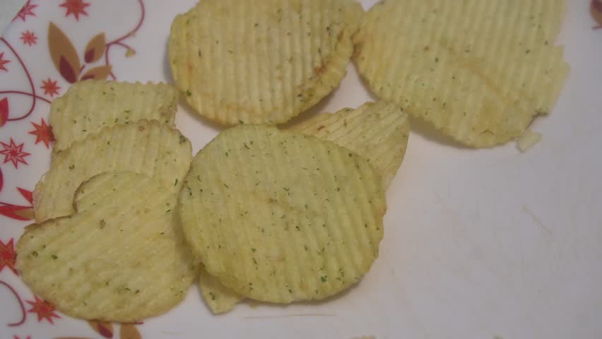 Potato chips are thin, crispy snacks made from sliced potatoes, fried or baked, seasoned with salt or flavors, and widely loved.