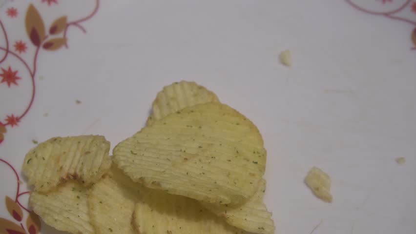 Potato chips are thin, crispy snacks made from sliced potatoes, fried or baked, seasoned with salt or flavors, and widely loved.