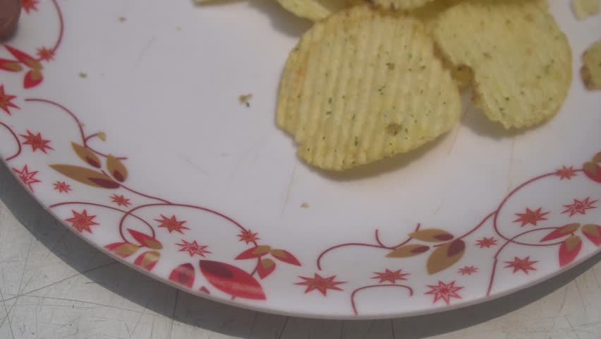 Potato chips are thin, crispy snacks made from sliced potatoes, fried or baked, seasoned with salt or flavors, and widely loved.