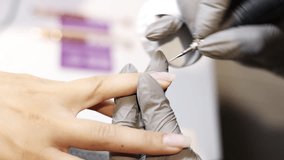 nail master applying gel polish, step by step guide.manicurist is using a nail file,drill, first,remove cuticle with nipper and push with stick.woman buffing,clean,degrease and using uv lamp. - Powered by Shutterstock - Get 15% off with code: PIKWIZARD15