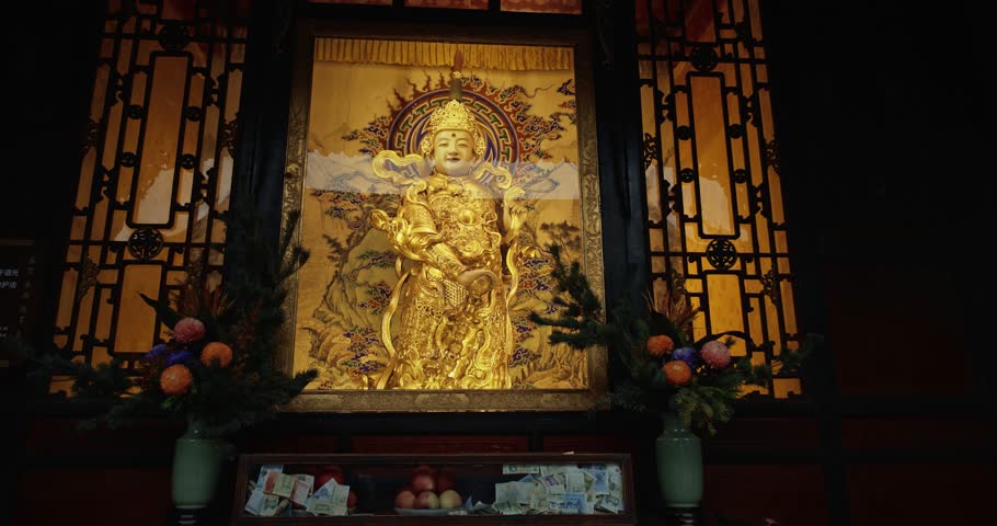 Chengdu, Sichuan, China. Golden Statue To Budhist Deity. Wenshu Monastery Authorized As National Key Buddhist Temple In China. Wenshu Monastery Buddhist Temple.