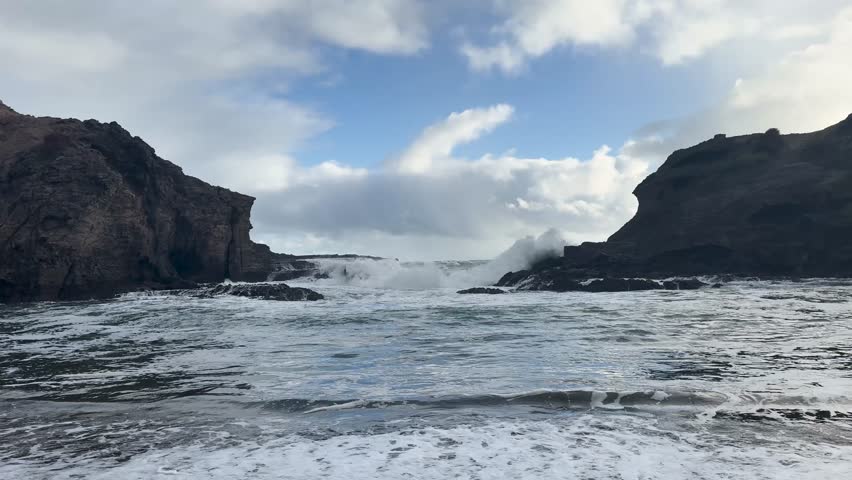 Beautiful lagoon and ocean beach in Piha, Auckland, New Zealand, before sunset.