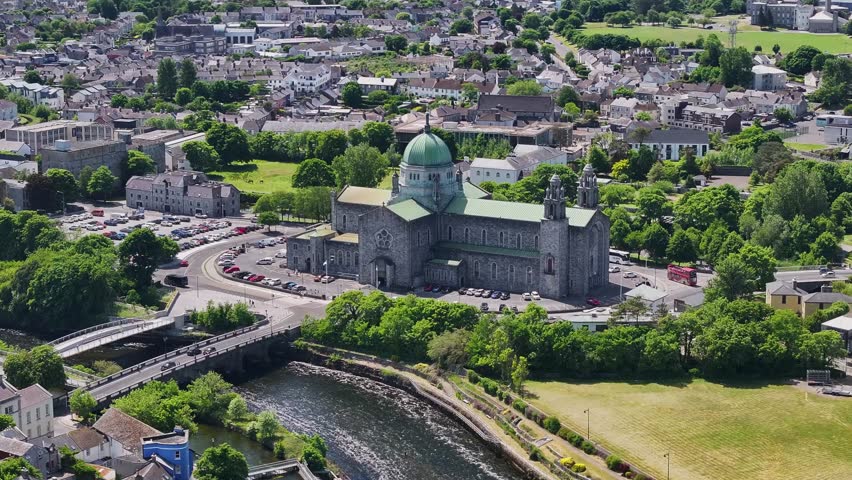 Amazing drone of Galway Cathedral one West Coast Ireland. Historical landmark on riverside.