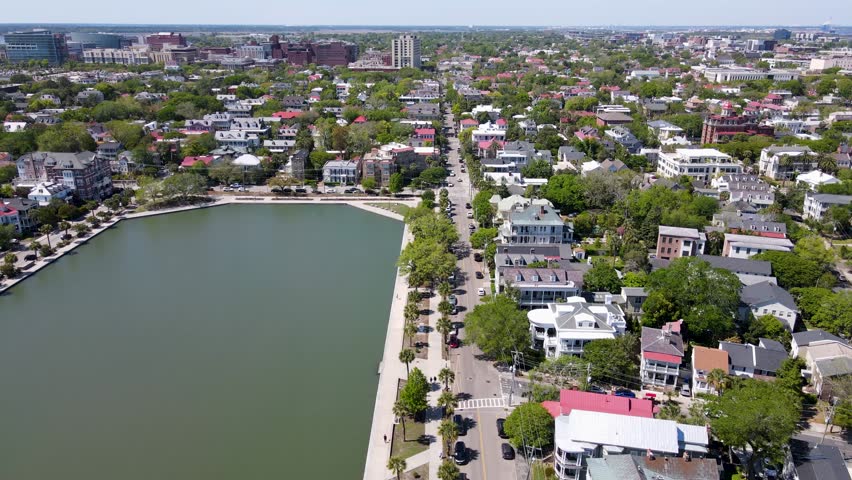 Charleston South Carolina aerial shot of Colonial Lake Park and street dolly forward shot wide