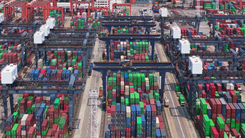 A Major Terminal Featuring Colorful Shipping Containers and Active Cranes, Representing International Trade and the Global Supply Chain Network. Container Terminal Managing Cargo Operations in Hong
