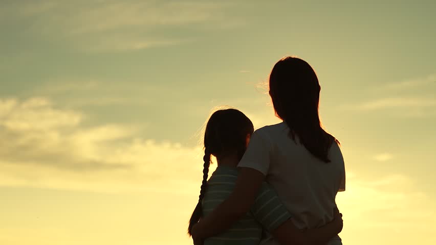 silhouette mother daughter embracing gazing serene sunset. warmth affection tranquility. Mother Child Hugging Sunset, Silhouette Loving Family, Mother Daughter Bond Nature, Happy Family Embracing
