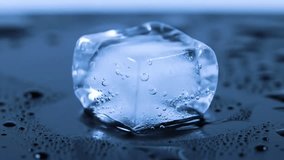 Time-Lapse of Ice Cube Melting on Dark Reflective Surface – Crisp, Cool Aesthetic - Powered by Shutterstock - Get 15% off with code: PIKWIZARD15