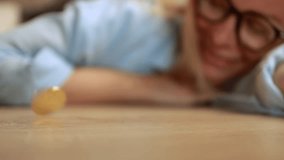 Professional female executive rotating golden cryptocurrency coin on workspace surface. Successful trading, cryptocurrency, crypto currency, bitcoin wallet, digital payment. Cryptocurrency - Powered by Shutterstock - Get 15% off with code: PIKWIZARD15