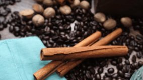 Cup or mug of coffee in a blue ceramic cup with whipped cream and a dash of nutmeg or cinnamon. Coffee beans surrounding a cozy cup of coffee in a blue mug. - Powered by Shutterstock - Get 15% off with code: PIKWIZARD15