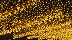 Christmas lights holiday background of garlands of glowing stars at night. Vintage street decoration of restaurant for the winter holidays, New Year. Blur, bokeh for your design - Powered by Shutterstock - Get 15% off with code: PIKWIZARD15