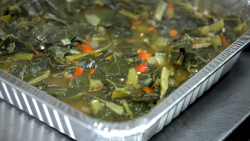 Steaming Collard Greens Transferred into Serving Tray
