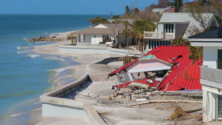 Hurricane Milton storm surge severe damage to waterfront house on Manasota Key, Florida. Destroyed home on gulf coast.
