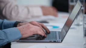 Close up office workers teamwork multitask working use laptop tablet paperwork documents multiethnic colleagues coworkers African businessman Indian businesswoman business corporate coworking company - Powered by Shutterstock - Get 15% off with code: PIKWIZARD15