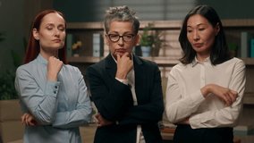 Multinational businesswomen thinking together thoughtful team business women females diversity girls office workers ponder ideas managers puzzled employees create solution decide deep thoughts indoor - Powered by Shutterstock - Get 15% off with code: PIKWIZARD15