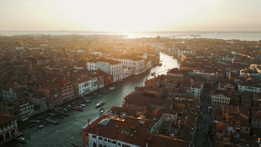 Venice italy skyline aerial view at sunrise golden sky. Venice grand canal and boats during sunrise, Venice, Italy. Drone shot
