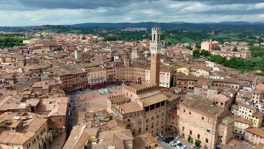 Siena old town, Italy, Aerial view of historic medieval buildings and rooftops in Siena, Tuscany region, Italy, drone shot of Piazza del Campo in Siena