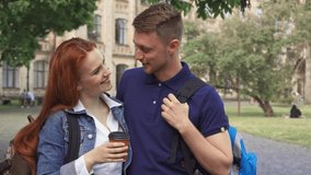 Charming couple of students flirt on a vibrant campus - Powered by Shutterstock - Get 15% off with code: PIKWIZARD15