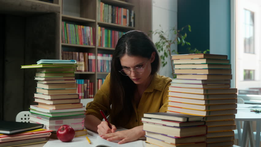 Caucasian high school student girl reader bookworm woman read books textbook learning studying female teacher copybook homework task reading library university college education prepare exam seminar
