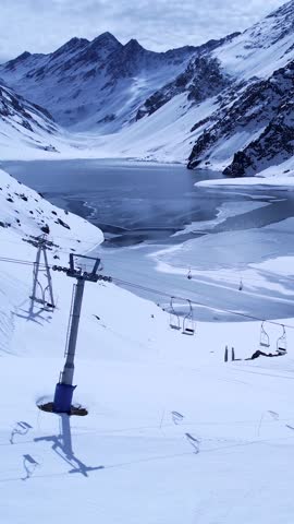 Ski Station Skyline In Santiago Chile. Snowy Mountains. Del Inca Lake. Travel Background. Ski Station Skyline In Santiago Chile. Ski Station Landscape. Snowcapped Valley.