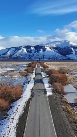 Patagonia Road At El Calafate In Santa Cruz Argentina. Snowy Mountains. Snow Capped Landscape. Santa Cruz Argentina. Winter Background. Patagonia Road At El Calafate In Santa Cruz Argentina.