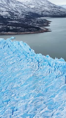 Perito Moreno Glacier At El Calafate In Santa Cruz Argentina. Stunning Landscape. Los Glaciares National Park. Iceberg Background. Perito Moreno Glacier At El Calafate In Santa Cruz Argentina.