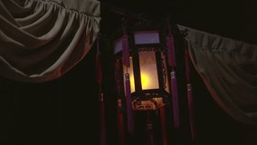This video shows an old, antique style creepy Chinese lantern flickering in the dark night sky. - Powered by Shutterstock - Get 15% off with code: PIKWIZARD15