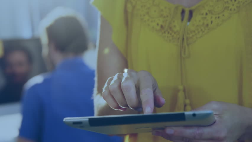 Woman tapping tablet, making glowing icon radiating connections showing social media network growth. Technology, innovation, connectivity, digital, collaboration, workspace, communication - Powered by Shutterstock - Get 15% off with code: PIKWIZARD15
