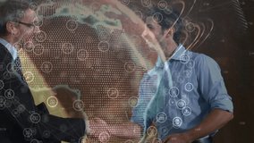 Two associates extending hands initiating handshake sealing deal, rotating globe showing data icons. Corporate, collaboration, technology, networking, professionalism, futurism, business - Powered by Shutterstock - Get 15% off with code: PIKWIZARD15