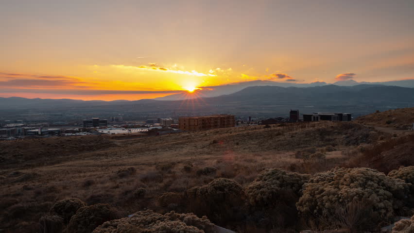 Beautiful sunset view over Salt Lake City, Utah with dramatic clouds